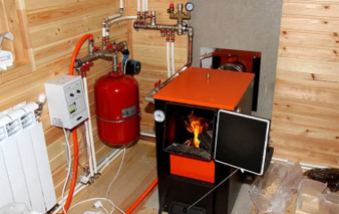 Установка твердотопливного котла